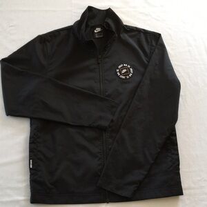 Nike size small mens rain coat.